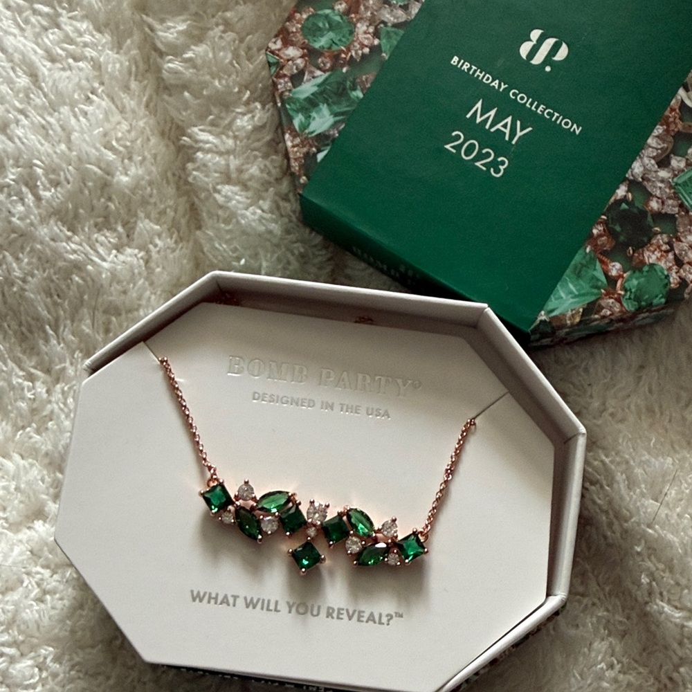 Rose gold and lab created emerald necklace